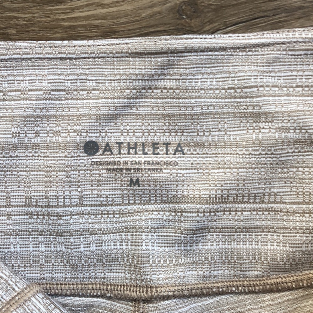 Athleta Leggings In a tan and white textured pattern. - Picture 7 of 13